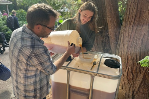 Pouring cider into a vat